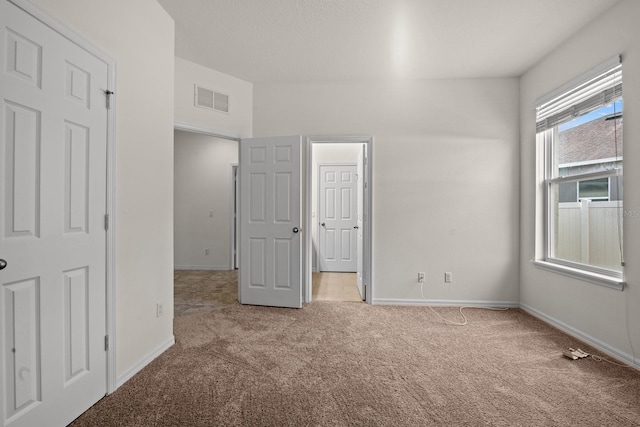 4032 Prairie Reserve Blvd, Orlando, FL 32824 - unfurnished bedroom with light colored carpet and baseboards