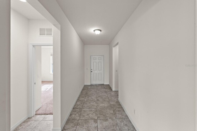 4032 Prairie Reserve Blvd, Orlando, FL 32824 - hall with baseboards