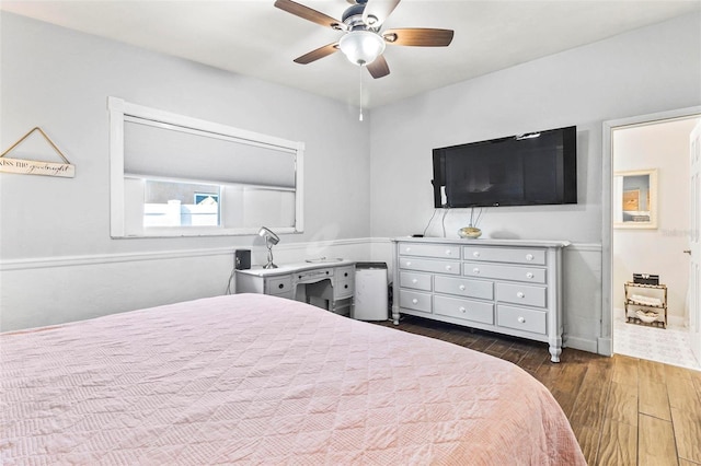 bedroom with ceiling fan and dark wood-type flooring