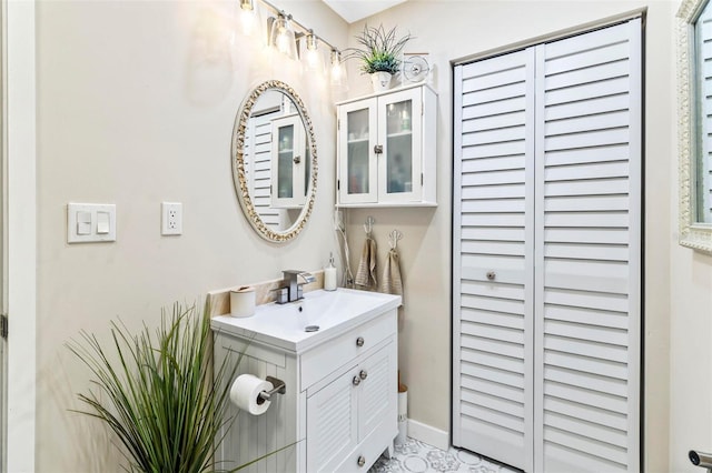 bathroom featuring tile patterned floors and vanity