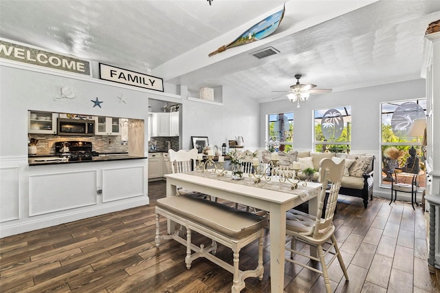 dining area featuring dark hardwood / wood-style floors and ceiling fan