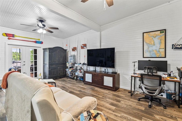 living room featuring french doors, ceiling fan, beam ceiling, and wood-type flooring