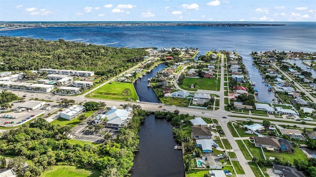 drone / aerial view featuring a water view