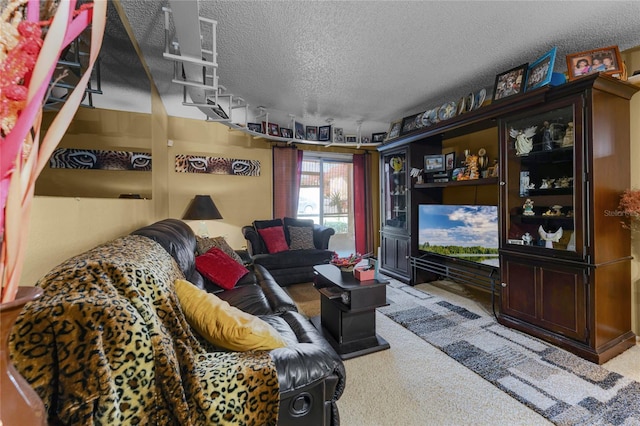 2868 N Powers Dr Unit 5, Orlando, FL 32818 - living room featuring light carpet and a textured ceiling