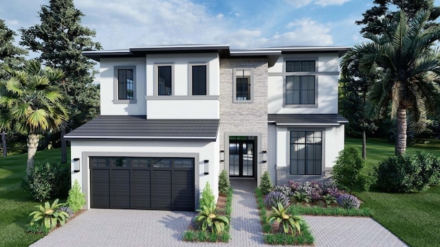 view of front facade featuring a front yard and a garage