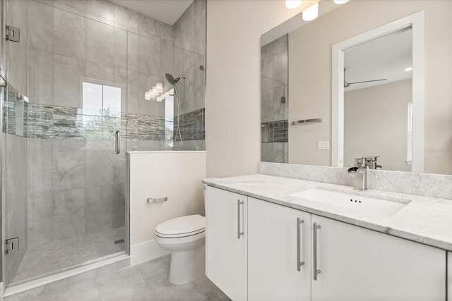 full bath with toilet, a shower stall, and vanity