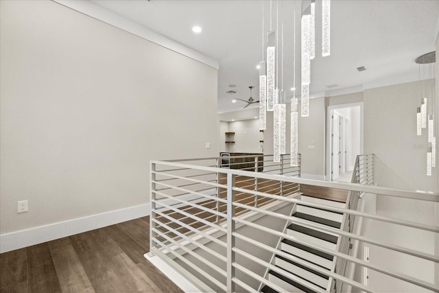 interior space with recessed lighting, baseboards, and wood finished floors