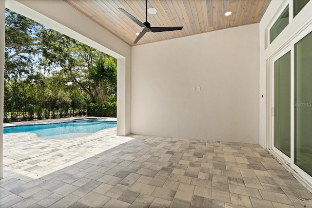 view of pool featuring a fenced in pool, ceiling fan, a patio area, and fence