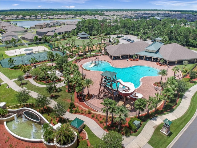 view of pool featuring a water view and a water slide