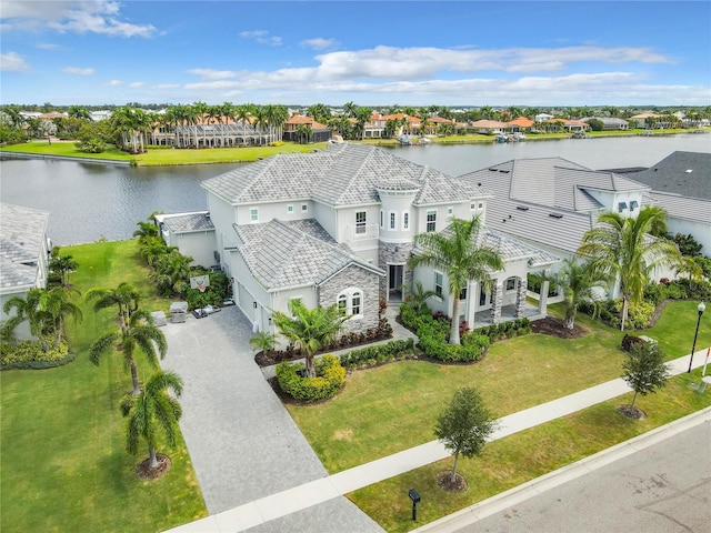 drone / aerial view with a water view