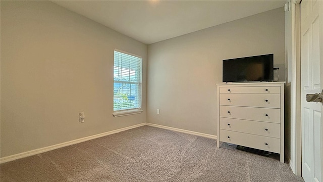 unfurnished bedroom featuring carpet floors