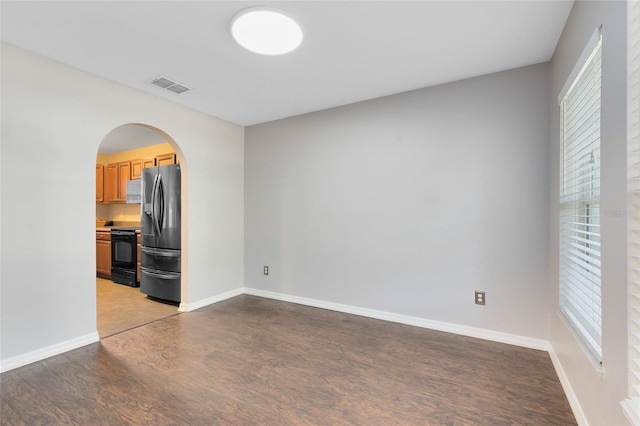 unfurnished living room featuring light wood-type flooring