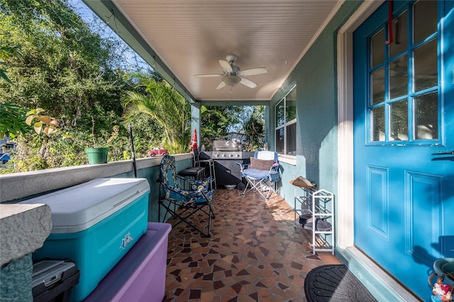 view of patio / terrace featuring ceiling fan