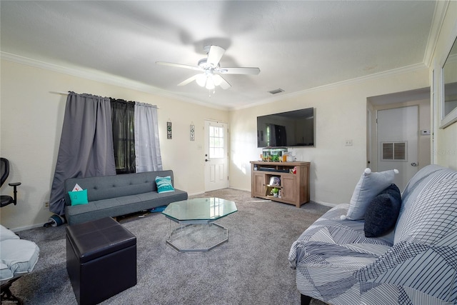 carpeted living room with ceiling fan and crown molding