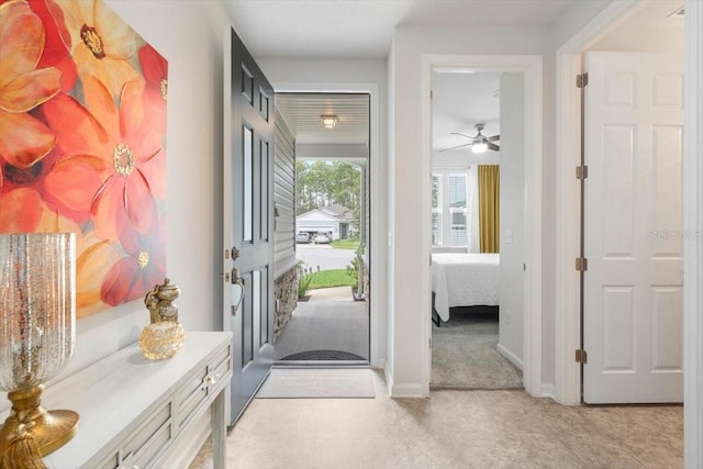 entryway with ceiling fan