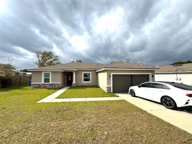 ranch-style home with a front lawn and a garage