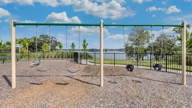 view of play area with a water view