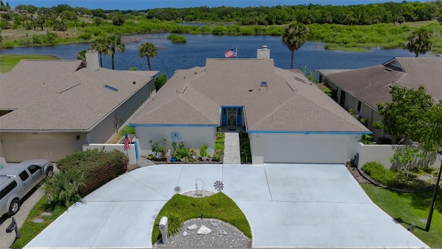 1433 Lake Marion Dr, Apopka, FL 32712 - birds eye view of property featuring a forest view and a water view