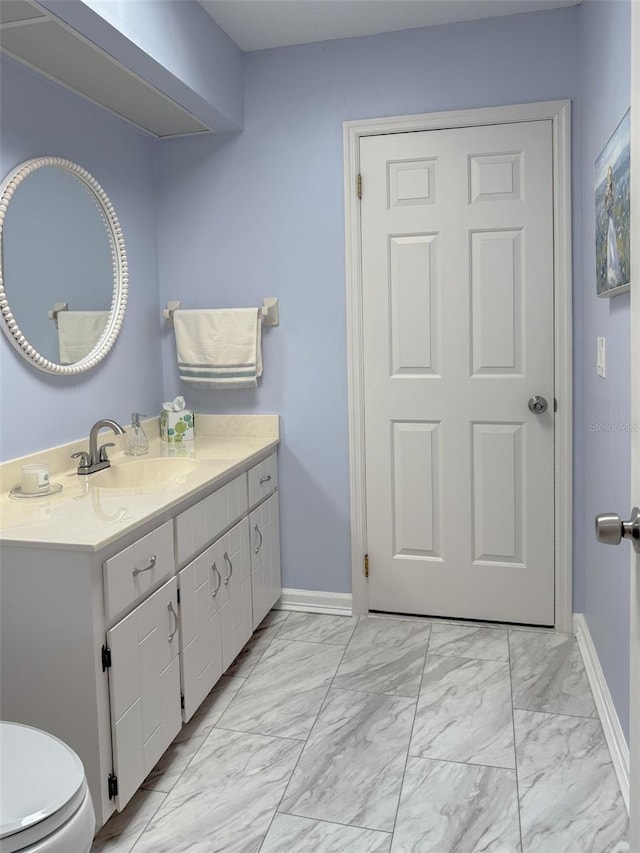 1433 Lake Marion Dr, Apopka, FL 32712 - bathroom with baseboards, marble finish floor, and vanity