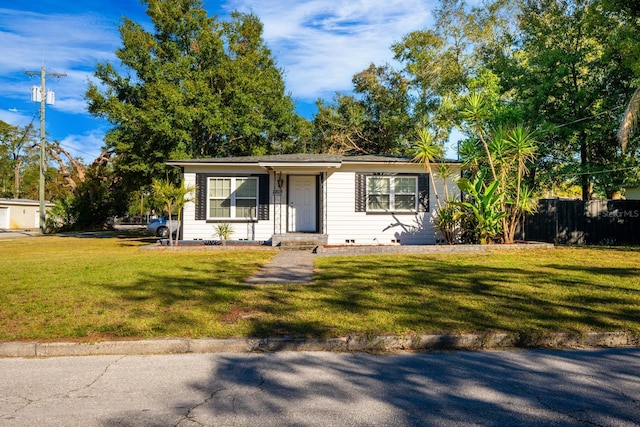 view of front of home with a front lawn