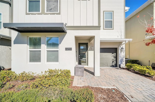 property entrance featuring a garage