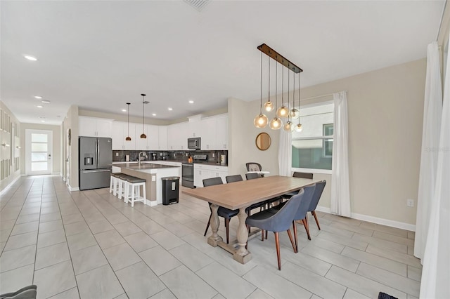 view of tiled dining space