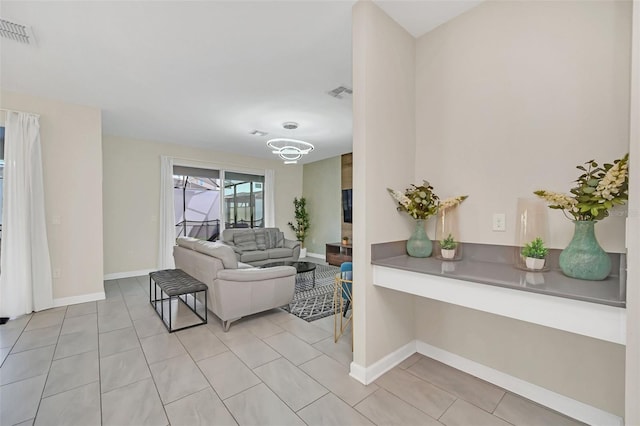 living room with light tile patterned floors