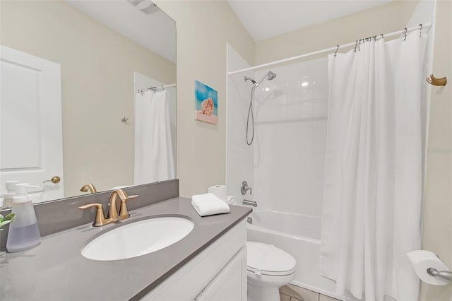 full bathroom featuring toilet, vanity, tile patterned flooring, and shower / tub combo with curtain