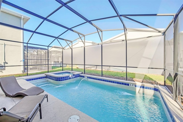 view of pool with an in ground hot tub, a lanai, pool water feature, and a patio area