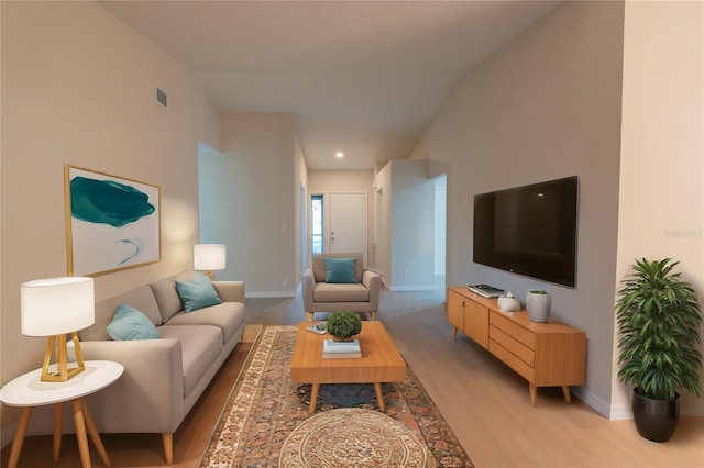 living room with light wood-type flooring and lofted ceiling