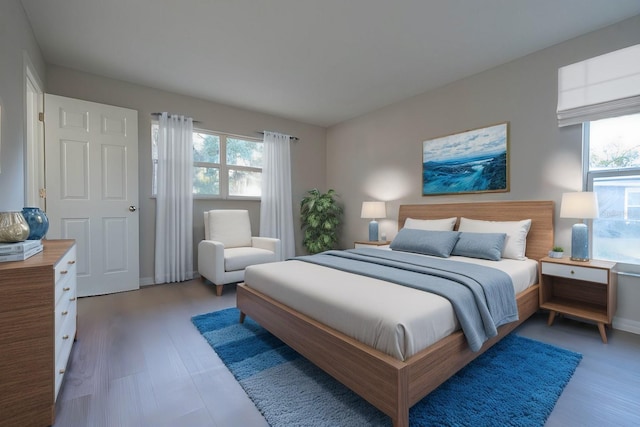 bedroom with hardwood / wood-style floors