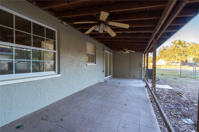 view of patio featuring ceiling fan