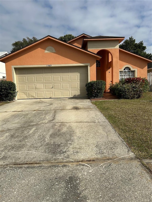 view of front of property with a garage