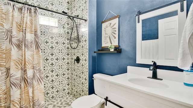 bathroom featuring a shower with curtain, toilet, and vanity