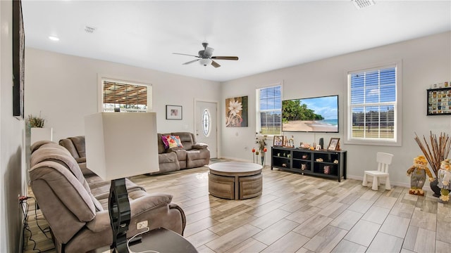 living room with ceiling fan