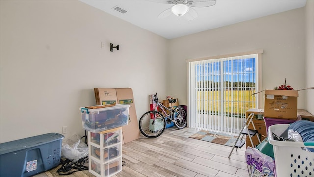 miscellaneous room with light hardwood / wood-style flooring and ceiling fan