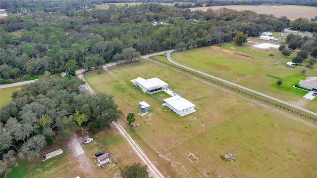 birds eye view of property featuring a rural view