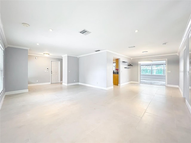 unfurnished room with visible vents, crown molding, baseboards, and light tile patterned floors