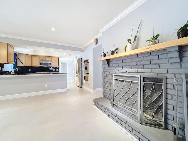 living area with a brick fireplace, baseboards, crown molding, and recessed lighting