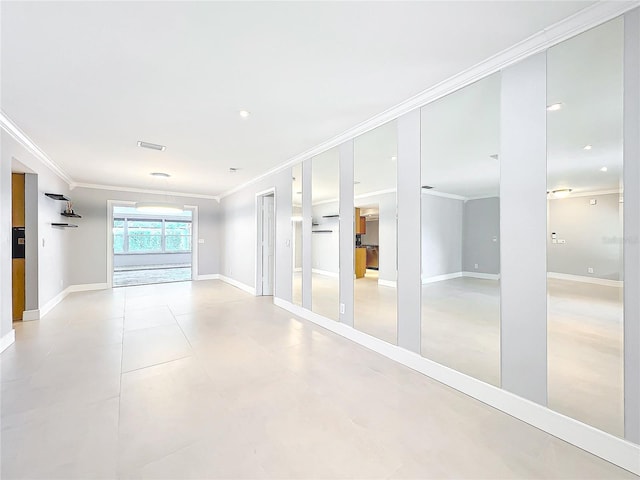 unfurnished room featuring ornamental molding, recessed lighting, visible vents, and baseboards