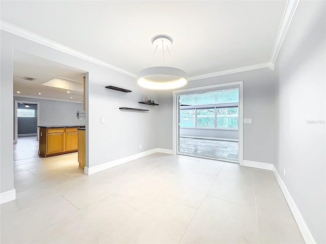 unfurnished room featuring visible vents, ornamental molding, baseboards, and light tile patterned flooring