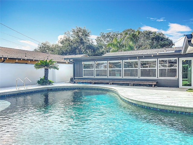 pool with a patio