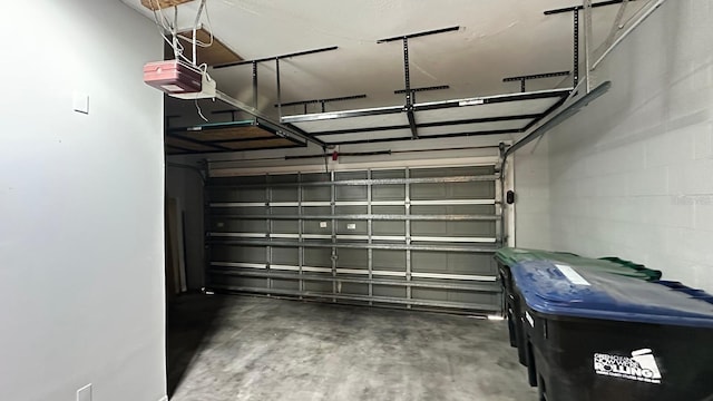 garage featuring a garage door opener