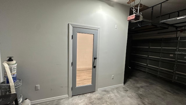 garage featuring a garage door opener