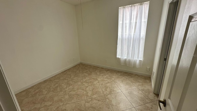 view of tiled empty room