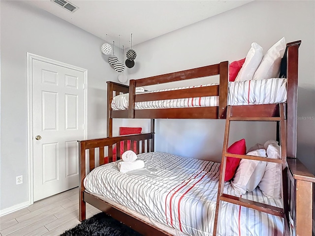 bedroom featuring light wood-type flooring