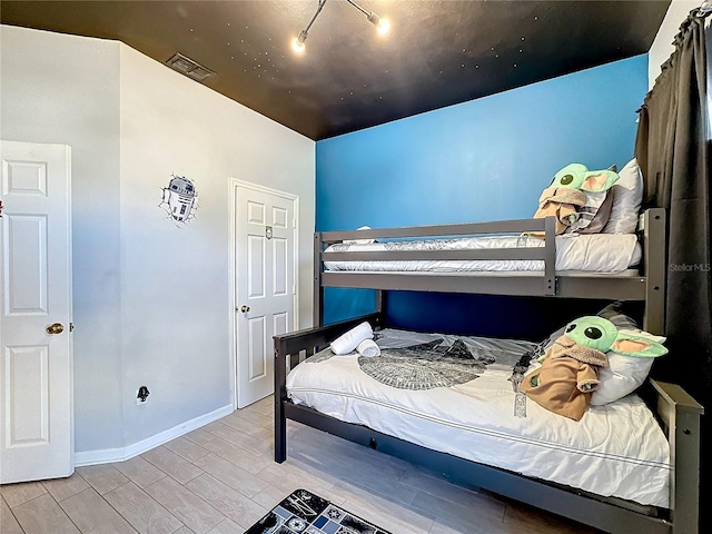 bedroom featuring light wood-type flooring