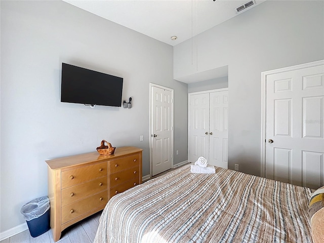 bedroom with light hardwood / wood-style floors