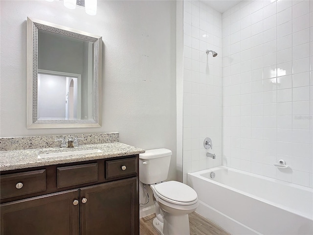 full bathroom with toilet, vanity, and shower / bathing tub combination