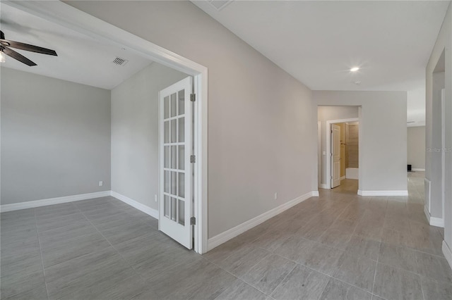 spare room featuring ceiling fan